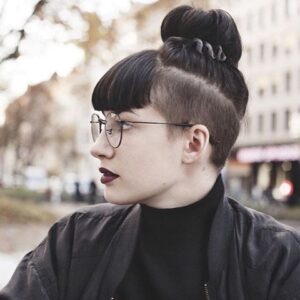 Shaved sides with bangs