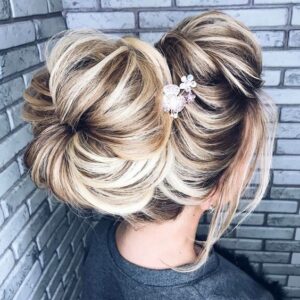 Sock Bun with Pompadour Bangs