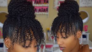 High bun and curly bangs