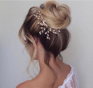 loose bun bride accessorized