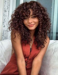big curly hair shoulders