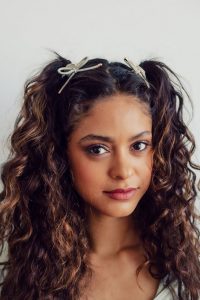pigtail half up curl