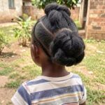Double Buns With Framing Braids