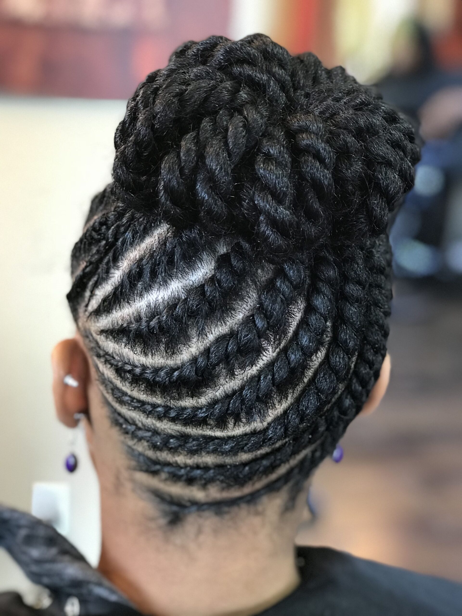 Feed in braid twists updo