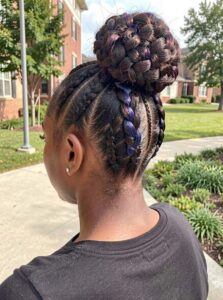 cornrow pigtails with colorful strings