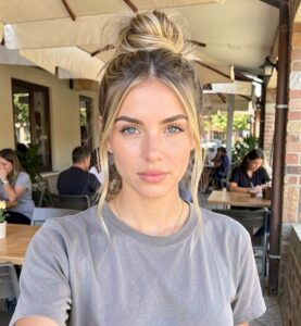 Prom Hairstyles Medium Hair - High Messy Bun and Loose Tendrils