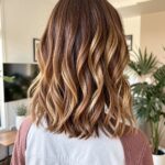 Collarbone Length Haircuts Curled Inverted Lob In Tortoiseshell Colours