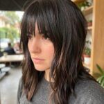 Collarbone Length Haircuts Modern Day Shag Cut With Heavy Bangs