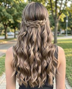 half pulled back braid curls