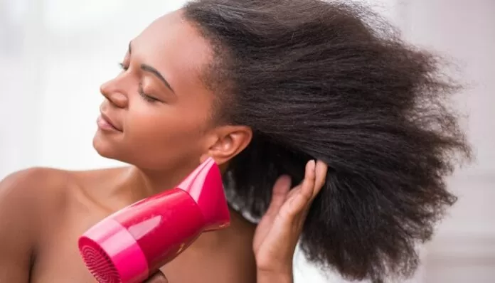 blow dry curly hair